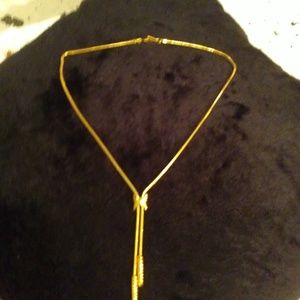 Gold tone choker necklace